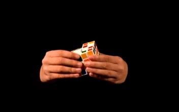 Stock Video Magician Solving A X Rubik Cube Animated Wallpaper