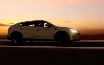 Stock Video Luxury Suv Traveling At Dusk Animated Wallpaper