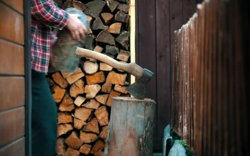 Stock Video Lumberjack Chopping A Small Log With An Ax Animated Wallpaper