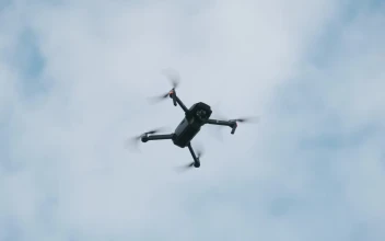 Stock Video Low View Of A Drone Flying Animated Wallpaper