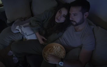 Stock Video Loving Couple Watching A Movie Together Animated Wallpaper