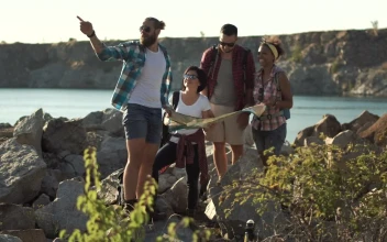 Stock Video Lost Tourists Searching The Map Near The Lake Animated Wallpaper