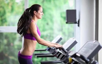 Stock Video Long Haired Sport Woman Running On Treadmill At Gym Animated Wallpaper