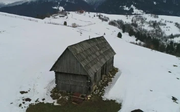 Stock Video Log Cabin On Top Of A Snowy Mountain Animated Wallpaper