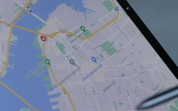 Stock Video Locating An Area On A Digital Map On A Tablet Animated Wallpaper
