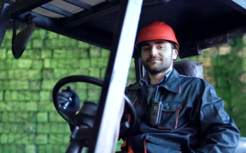 Stock Video Loading Vehicle Operator Smiling To The Camera Animated Wallpaper