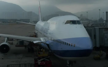 Stock Video Loading Freight Onto A Large Plane Animated Wallpaper