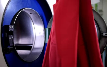 Stock Video Loading A Washing Machine With Clothes Animated Wallpaper