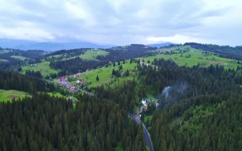 Stock Video Little Village In A Spring Mountains Animated Wallpaper