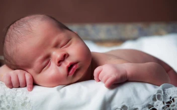 Stock Video Little Newborn Baby Sleeping Upside Down Animated Wallpaper