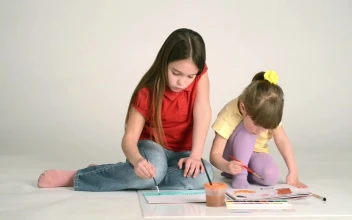 Stock Video Little Girls Painting On The Floor Animated Wallpaper