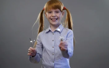 Stock Video Little Girl With Two Sparklers Animated Wallpaper