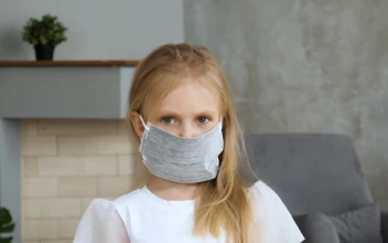 Stock Video Little Girl Wearing A Face Mask At Home Animated Wallpaper