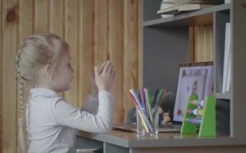 Stock Video Little Girl Taking Classes Online Animated Wallpaper