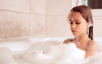 Stock Video Little Girl Taking A Bath In The Tub Animated Wallpaper