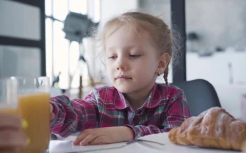 Stock Video Little Girl Refuses Orange Juice For Breakfast Animated Wallpaper