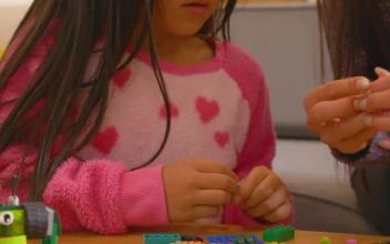 Stock Video Little Girl Playing With Legos With Mom Animated Wallpaper