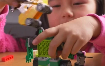 Stock Video Little Girl Playing With Her Legos Animated Wallpaper