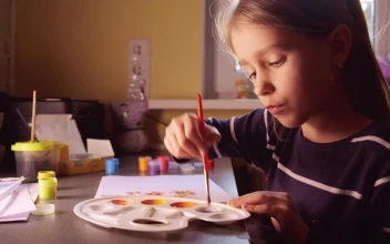 Stock Video Little Girl Painting With Watercolors At Home Animated Wallpaper