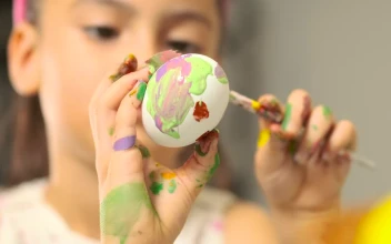 Stock Video Little Girl Painting Easter Eggs Shallow Focus Animated Wallpaper
