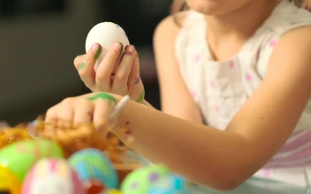 Stock Video Little Girl Painting Easter Eggs Animated Wallpaper