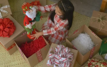 Stock Video Little Girl Opening Gifts At Christmas Animated Wallpaper