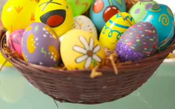 Stock Video Little Girl Leaving An Easter Egg In A Basket Animated Wallpaper