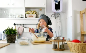Stock Video Little Girl In The Kitchen Preparing Cookies Animated Wallpaper