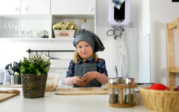 Stock Video Little Girl In A Kitchen Making Cookies With Dough Animated Wallpaper