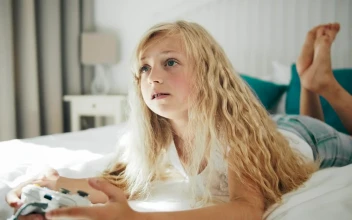 Stock Video Little Girl Happy To Win Playing A Video Game Animated Wallpaper
