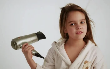 Stock Video Little Girl Drying Her Hair After A Bath Animated Wallpaper