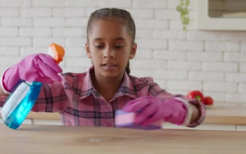 Stock Video Little Girl Cleaning In A Kitchen With Detergent Animated Wallpaper