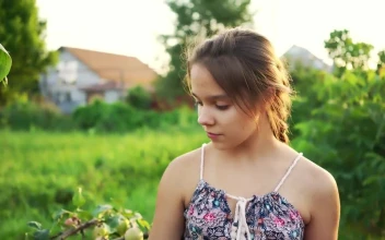 Stock Video Little Girl Collecting Apples In A Garden Animated Wallpaper