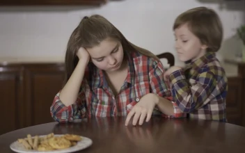 Stock Video Little Brother Whispers A Secret To His Sister Animated Wallpaper