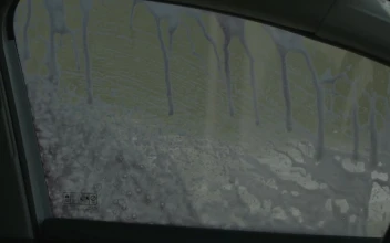 Stock Video Little Boy Is Cleaning A Window Car Animated Wallpaper