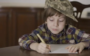 Stock Video Little Boy In Army Hat Writing Letter To Soldier Animated Wallpaper