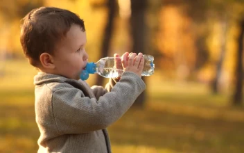 Stock Video Little Boy Drinking Water From A Bottle Animated Wallpaper