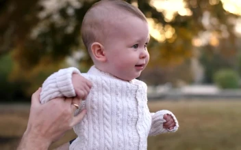 Stock Video Little Baby Walking Helped By His Father Animated Wallpaper