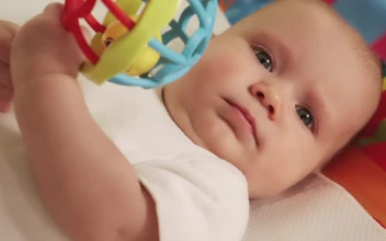 Stock Video Little Baby Playing With His Hanging Toy Animated Wallpaper