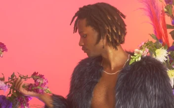 Stock Video Lgbtq Man Among Flowers While Appreciating Them Animated Wallpaper