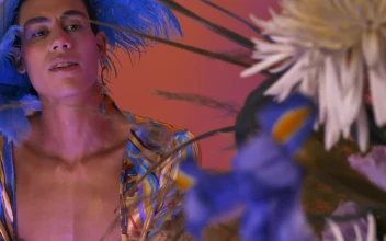 Stock Video Lgbtq Guy With A Striking And Feminine Wardrobe Animated Wallpaper