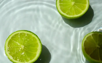 Stock Video Lemons Falling Into A Pond With Water Animated Wallpaper