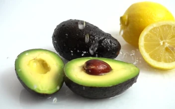 Stock Video Lemon And Avocado Being Wet By A Jet Of Water Animated Wallpaper