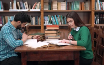 Stock Video Learning Partners Study In University Library Animated Wallpaper