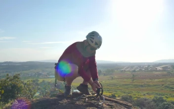Stock Video Laying A Safety Rope On Top Of The Hill Animated Wallpaper