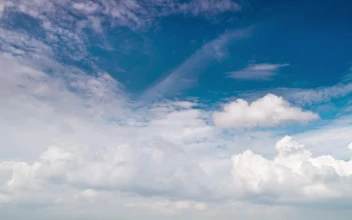 Stock Video Layers Of Fluffy Clouds Against The Blue Sky Animated Wallpaper