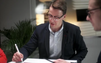 Stock Video Lawyers Discuss Strategy In Late Night Meeting Animated Wallpaper