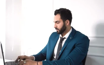Stock Video Lawyer Types On Laptop In Minimal Office Animated Wallpaper