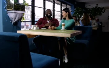Stock Video Laughing Couple In A Coffee Shop Animated Wallpaper