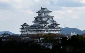 Stock Video Large Japanese Building Sticking Out From The Trees Smal Animated Wallpaper